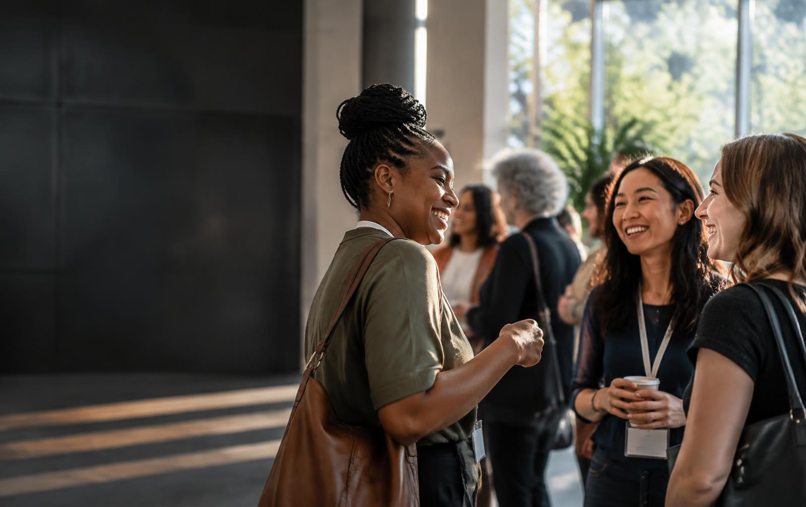 Women connecting and sharing ideas at a community event